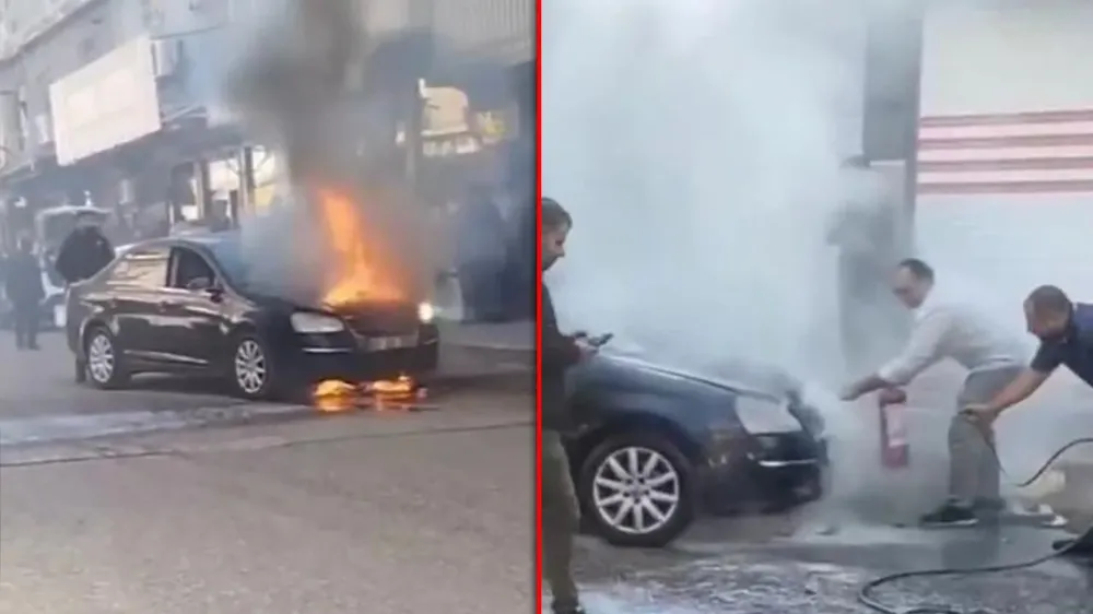 Park halindeki bir otomobilin motor kısmında angın çıktı.